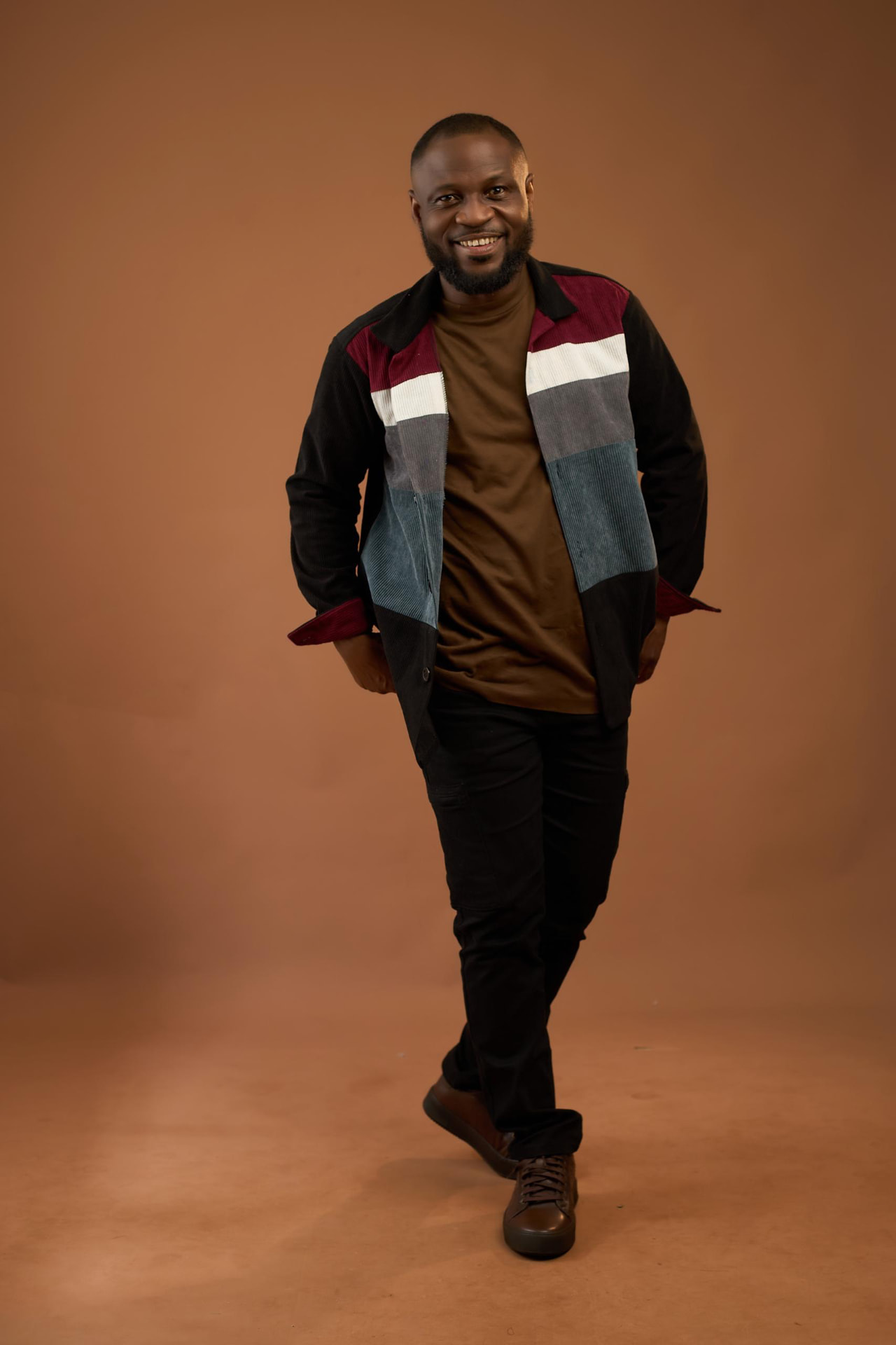 Full-length studio portrait of Pastor Edwin Dadson