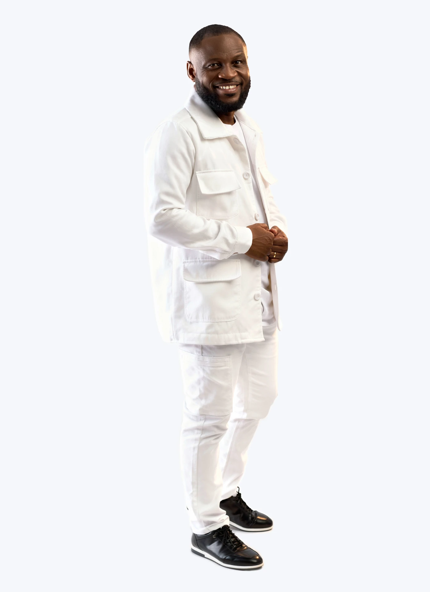 Full-length portrait of Pastor Edwin Dadson in white
