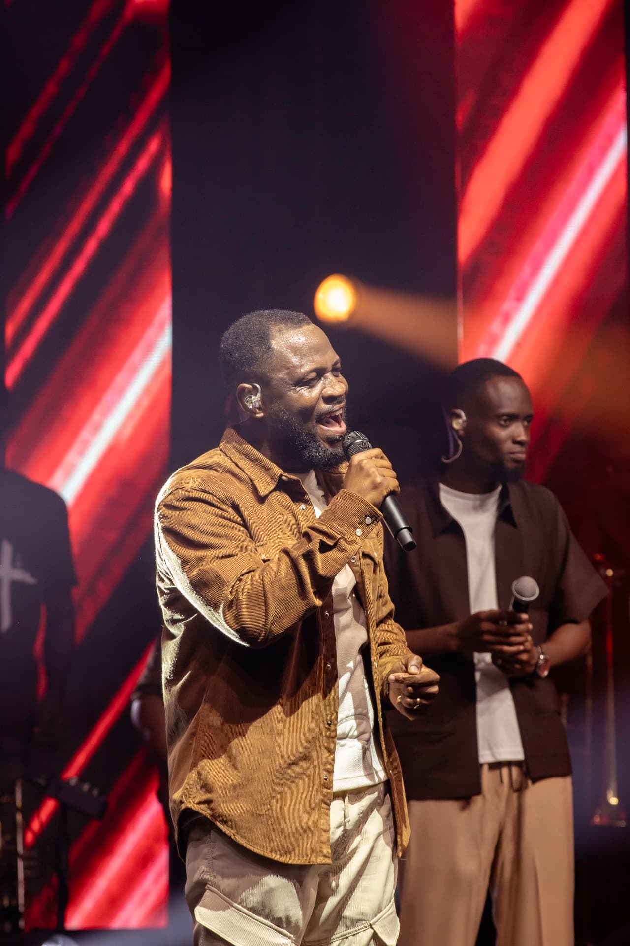 Pastor Edwin Dadson leading worship